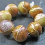 Set of 8 Handmade Clay Roun..