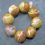 Set of 8 Handmade Clay Roun..